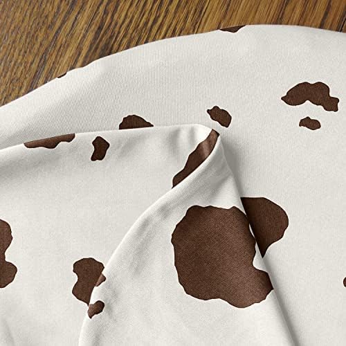 Side angle view of gender neutral western cow print nursing pillow slipcover