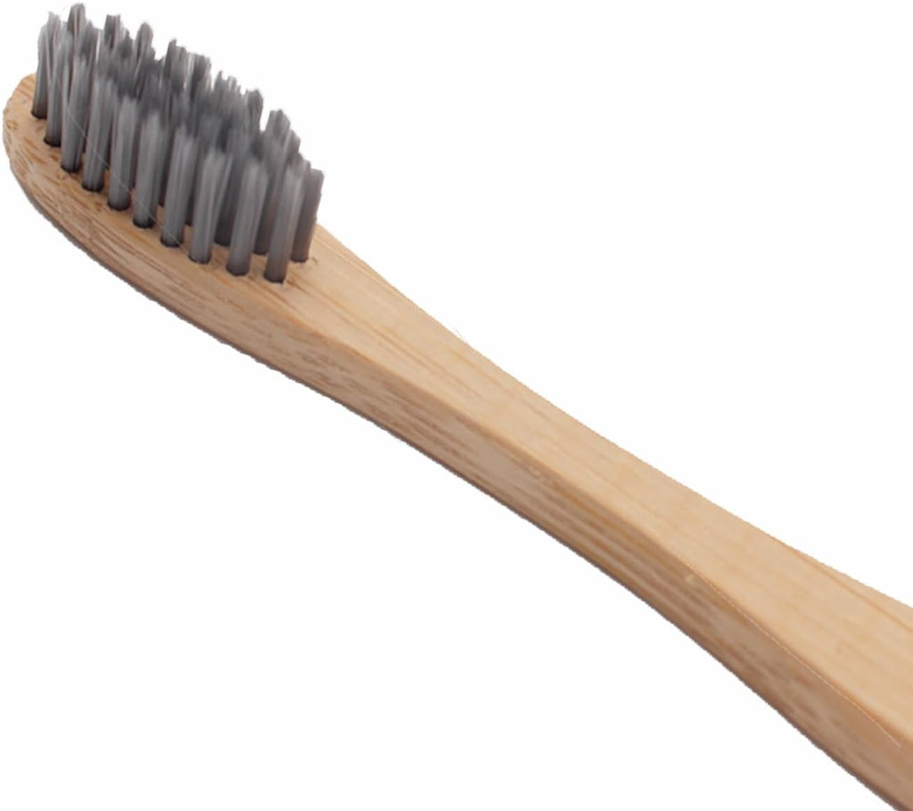 Close up of H&H Pets sustainable bamboo handle toothbrush