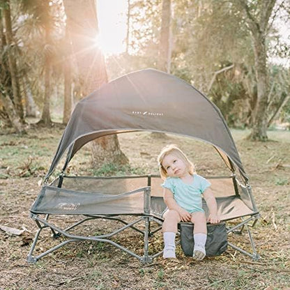 Baby Delight portable cot side profile showing the storage pocket and secure framing