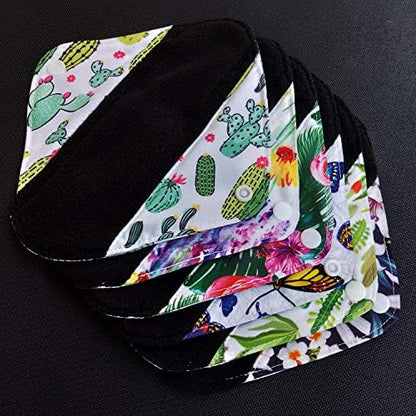 Six piece set of MissC2C charcoal cloth liners spread out showing various prints.
