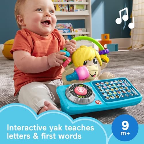 Close-up view of the light-up microphone and colorful letter buttons on the interactive educational toy.