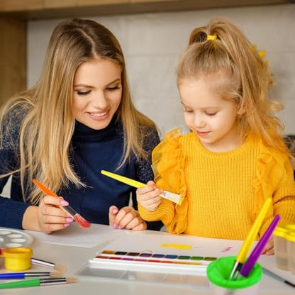 Close up of the round and flat hog bristles on the toddler paint brushes