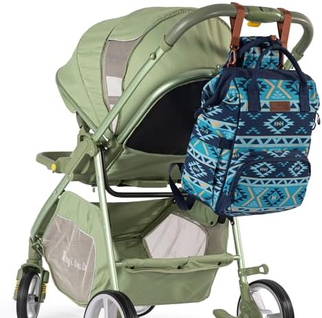 Wrangler travel backpack attached to stroller handles using integrated stroller straps