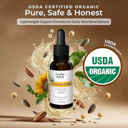 Everyday Beauty Certified Organic Vitamin E Oil showing the dropper application on clean skin