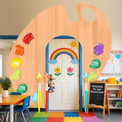 Three piece artist palette door curtain banner hanging on a preschool classroom entryway.