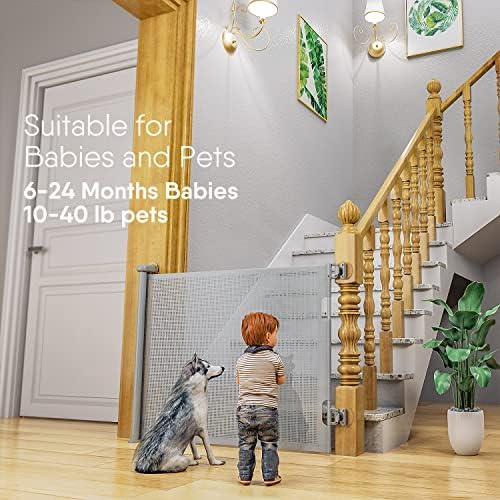 Child proof safety gate fully retracted next to indoor staircase stairs