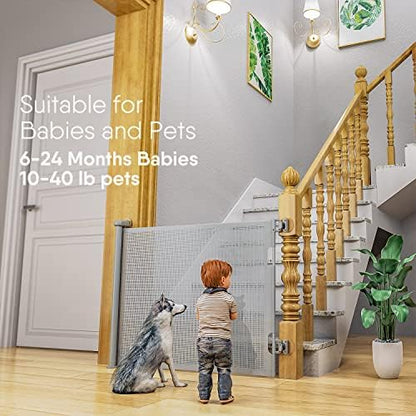 Child proof safety gate fully retracted next to indoor staircase stairs