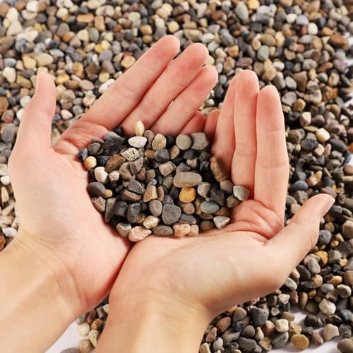 Handful of natural beige coarse silica sand substrate