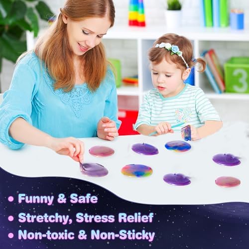 Airtight small storage cups containing colourful galaxy slime party supplies.