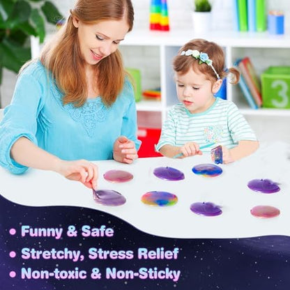 Airtight small storage cups containing colourful galaxy slime party supplies.