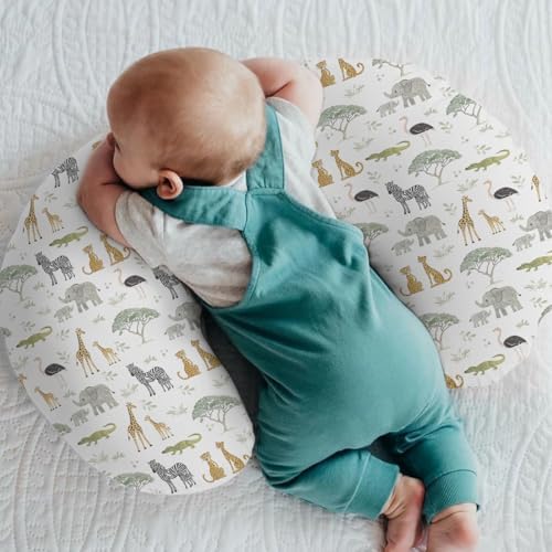 Close up of elephant and zebra pattern on nursing pillow slipcover