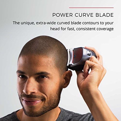 Waterproof head shaver and beard trimmer being rinsed clean under running tap water.