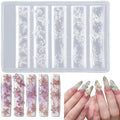 Maycreate 3D Flower Silicone Nail Mold set showing four distinct pattern strips on a flat surface.