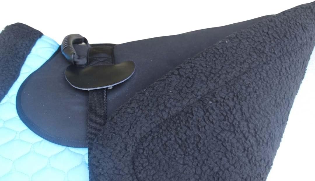 Professional Equine turquoise quilted trail saddle pad side profile view