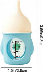 Disassembled parts of the 20milliliter small animal feeding kit demonstrating the easy clean components and soft teat