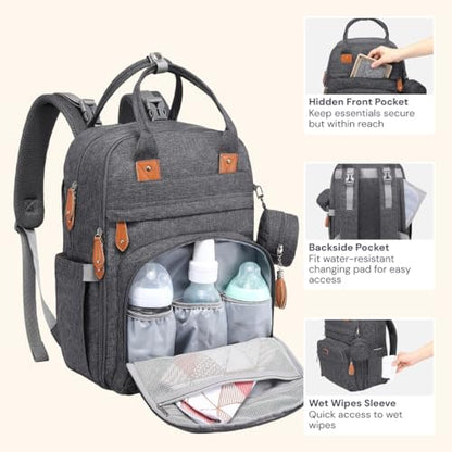 BabbleRoo water resistant backpack attached to a baby stroller using the built in detachable straps.