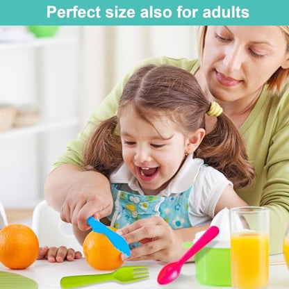 Jawbush reusable kids feeding utensils on a table