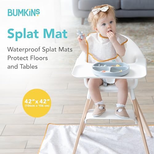 Bumkins waterproof high chair floor mat catching fallen baby food during mealtime
