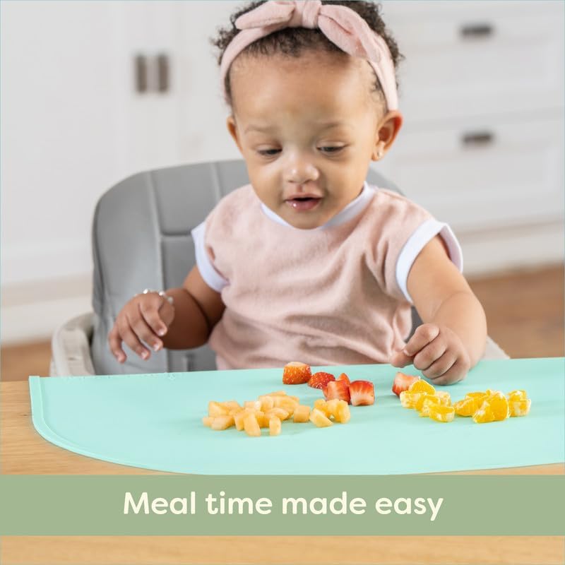 Close up look at the durable mint colored food grade silicone dining mat.