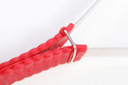 NRTFE heavy duty animal hair remover blade being cleaned under running water