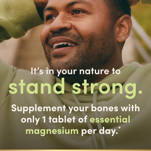 Authentic USA imported Nature's Bounty Magnesium whole body support product seals and batch code verification.