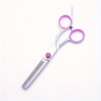 PAWCHIE steel grooming comb detangling dense pet fur and knots.