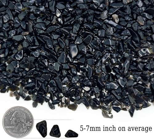 Black decorative pebbles used in a fish tank setup
