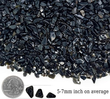 Black decorative pebbles used in a fish tank setup