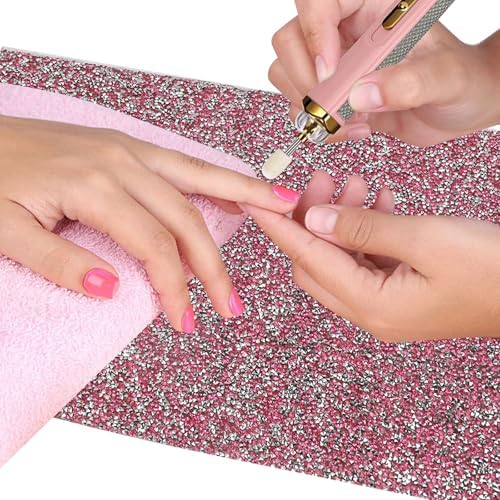 Top view of washable nail art mat on salon table