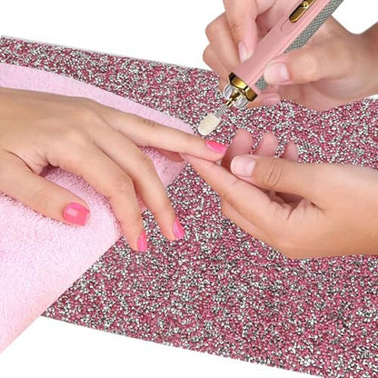 Top view of washable nail art mat on salon table