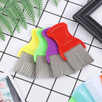 Anti-slip handle detail of Maitys grooming comb showing textured grip