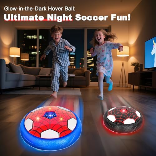 Two pack of light-up floating football toys gliding across a wooden living room floor.