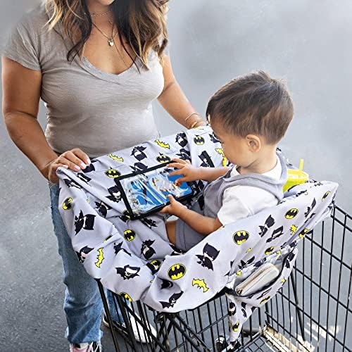 Close up view of the J.L. Childress high chair cover showing the integrated clear smartphone pocket with a phone inside.