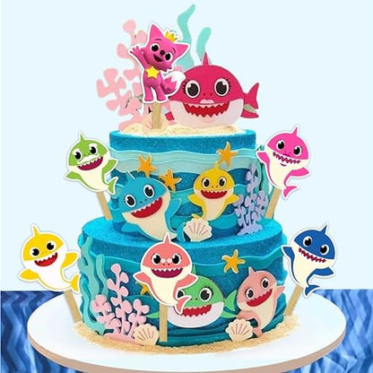 Close up of shark family character cupcake decorations
