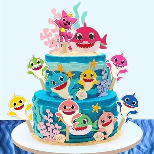 Close up of shark family character cupcake decorations