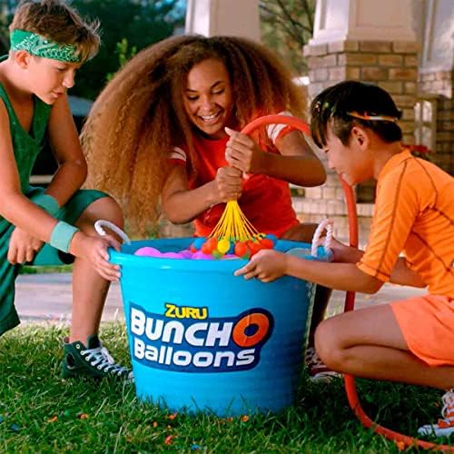 Dozens of multicolored self tying water balloons filling simultaneously over a water bucket.