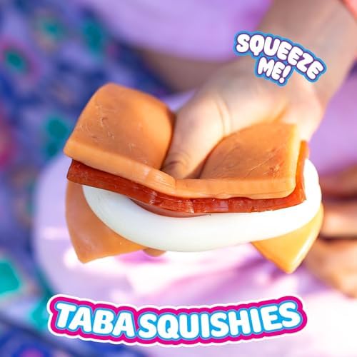 A person peeling apart the sticky components of the Mushmeez Taba sensory food toy to show its interactive design