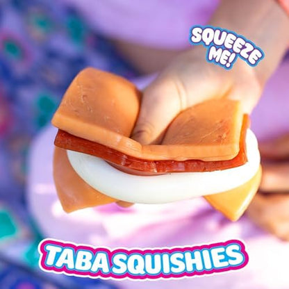 A person peeling apart the sticky components of the Mushmeez Taba sensory food toy to show its interactive design