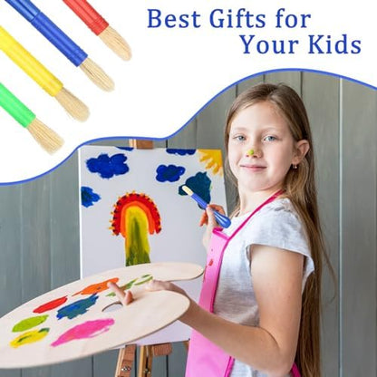 Four colorful toddler tempera paint brushes laid out on a white surface