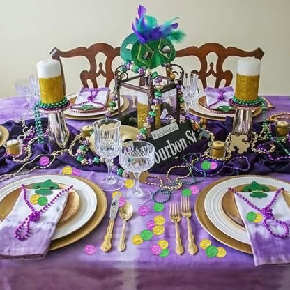 Table setting decorated with 100 piece Mardi Gras coin set