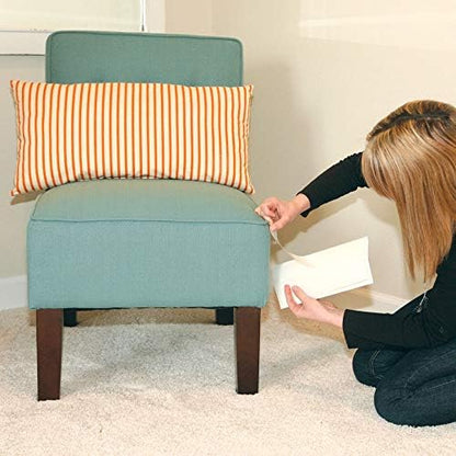 Non toxic cat training tape being peeled off couch fabric safely