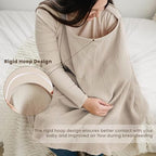 Mother using Konssy breastfeeding apron in public