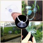 XLIUAX suction cups installed on clean aquarium glass wall.