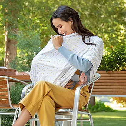 Parent using Munchkin 5-in-1 cover for breastfeeding privacy