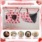 Adjustable corner straps on a pink hanging guinea pig hammock bed