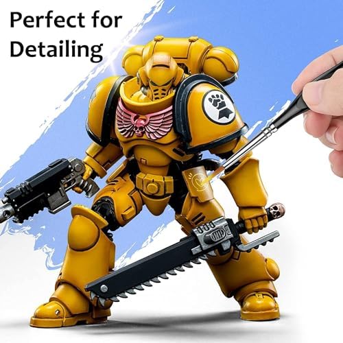 Fuumuui miniature paint brushes being used for precise detailing on a small scale model figure