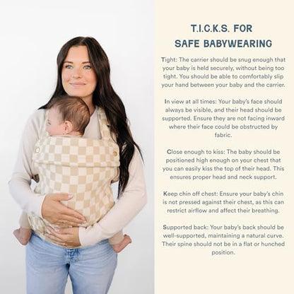 Parent wearing Ava & Oliver baby carrier for back carry