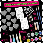 Creative transfer stickers, 3D gems, and googly eyes for decorating custom rock art.