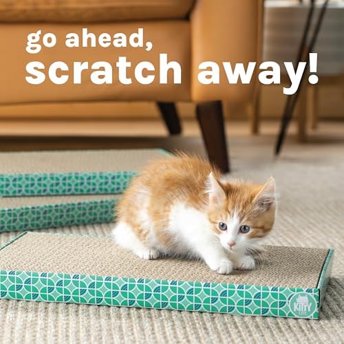 Cat enjoying Kitty City corrugated scratching pad with catnip