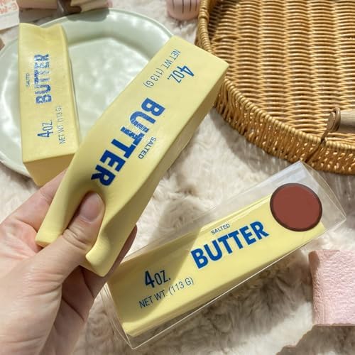 YOXIER non toxic soft polyurethane foam sensory toy being held to display its portable fourteen centimeter size.